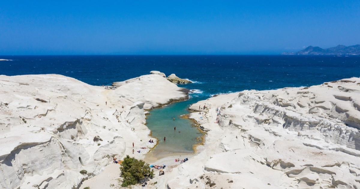 The white rock formations and turquoise inlet of Sarakiniko beach on Milos, Greece